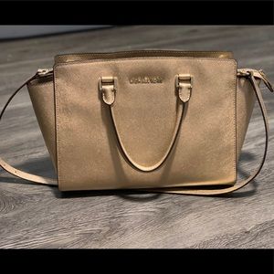 Michael Kors gold handbag